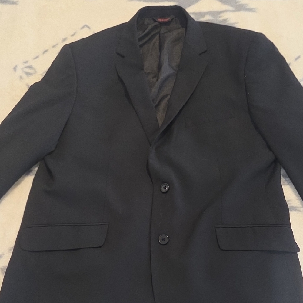 Linea Uomo Blazer w/ snake skin style interior. $260 At Men's Wearhous (see pic)